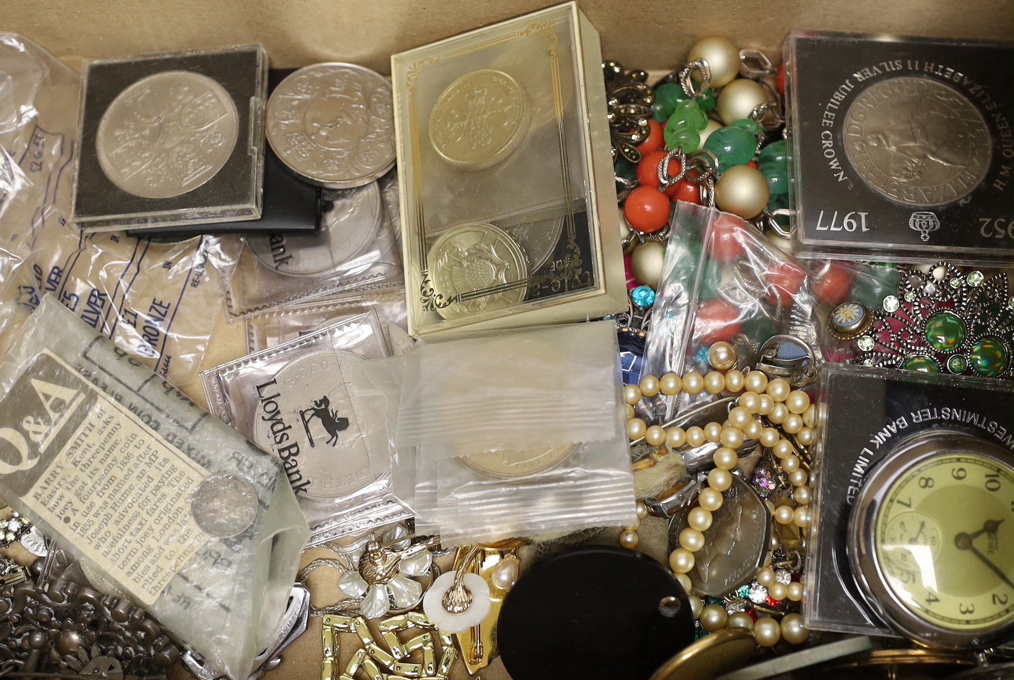 A quantity of assorted costume jewellery including paste set, together with assorted coins and loose stones.